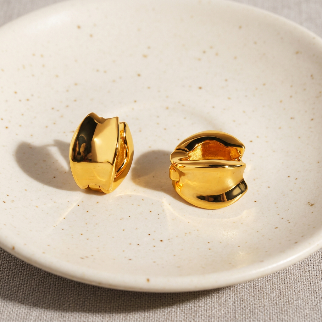 Sienna gold-plated hoop earrings alternate view on ivory ceramic